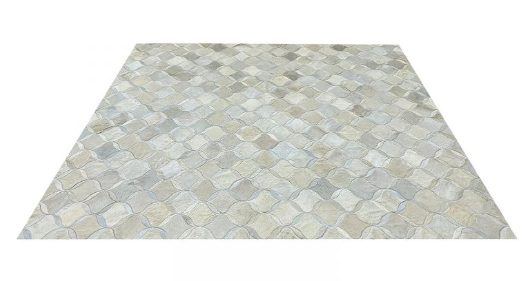 Off White and Grey Cowhide Hide Rugs add texture and warmth in neutral colors to interior design projects