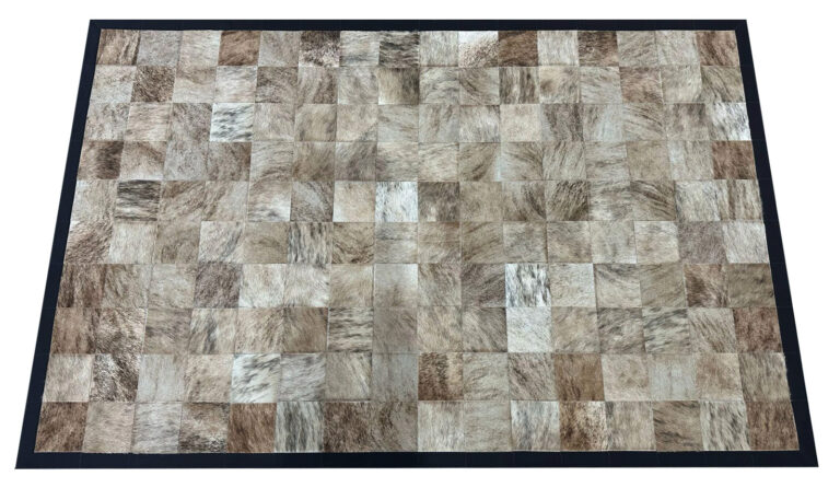 Light Brindle cowhide rug combines creams, greys and beige mixed natural colors